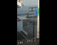 Two girls practice dance stairs clothes pin