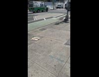 Minivan driving with cloud of smoke trailing it