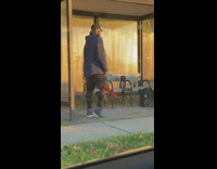 Guy jacket dance on bus stop longboard
