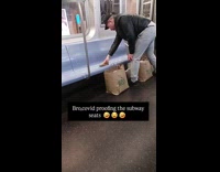 Man wipes off subway seat with water part 1