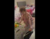 Mom playing cashier and groceries with little girl 