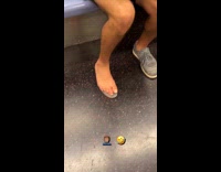 Guy rides subway only wearing one shoe