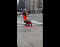 Astronaut crosses street with cart 