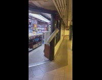 Portable AC inside subway station liquor store 