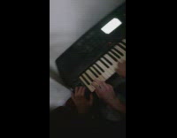 Guys play keyboard together with drum sounds
