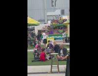 Guy white shirt drink vlog universal studios