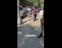 A woman in full snorkeling outfit on the street