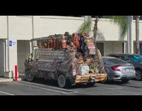 Collab Kook Of The Day - Run down dirty old brown van with orange safety cone
