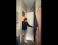 Woman wear bear mask scares mom behind door