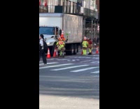 Group of traffic cone heads walking on street 