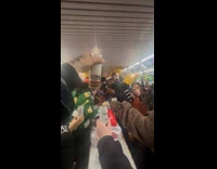 People set up Thanksgiving celebration inside subway part 1