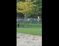 Girl kneel pose park grass tripod racket