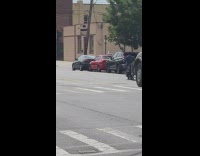 Man drive motorcycle drag shopping cart street