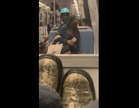 Man in blue helmet has nostrils plugged