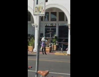 Woman white sweater promote product sidewalk pictorial