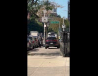Black car maneuver and drive on sidewalk part 2