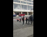 Guy dances while ringing bell 