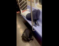 Man passed out on train seats
