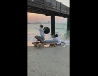 Little girl dress beach pictorial camera crew