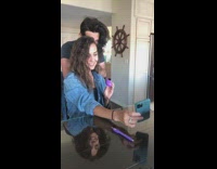 Girl takes selfie with purple egg