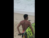 Collab Kook Of The Day - Guy highlight yellow surfboard surf tattoo on back