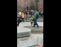Kids ride bike on back tire 