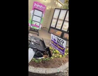 Woman ordering taco bell broken speaker machine