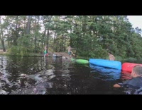 Guy runs across colorful upside down canoes fail falls into lake