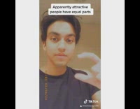 Guy measures forehead nose mouth with fingers 