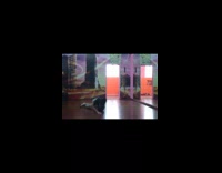 Guy break dances and slams the floor hard