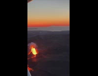 View of Volcanic Eruption from Plane Ride