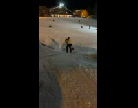 Guy backflip on snow ramp lose his ski blades