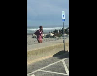Girl purple sweater dance tiktok sign beach