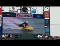 Guy on yellow wakeboard on TV Oracle Park