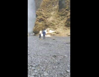 shirtless guy waterfall photoshoot weird pose