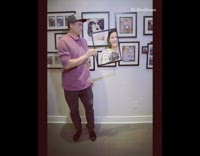 Guy makes family portrait with wife baby