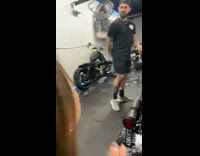 Girl pushes air hose up guys butt 