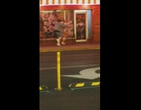 Man and Woman wears jean jacket tiktok on the sidewalk