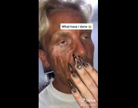 Guy with tear streaks on fake tan 