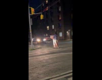 Couple ride single scooter carry pizza boxes part 2