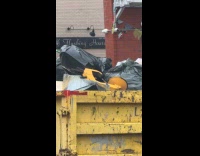 Unpaid ticket parking boot on garbage truck