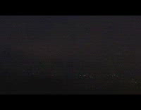 Lightning strike behind the dark clouds