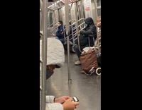 Blue jacket person smokes on subway 