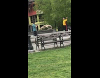 Guy yellow sleeves black cape lock dance