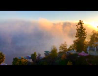 Time lapse of fog rolling over lake