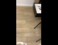 Lights reflect on flood water inside apartment