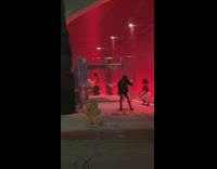 woman squatting red circle buildnig