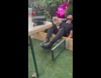 Friends sing happy birthday and fall backwards on bench