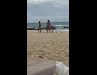 Two women in bikini tiktok dance at the beach