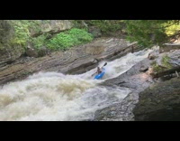 Girl in kayak gets flipped upside down 